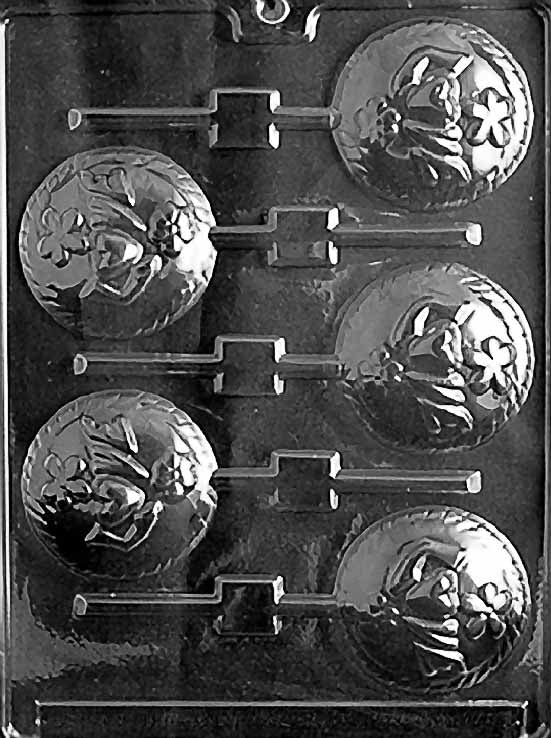 LOVE DISC Lollipop chocolate mold with round lollipop cavities embossed with “Love”; clear mold.
