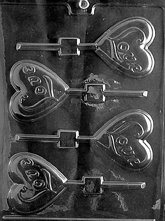 LOVE HEART Lollipop chocolate mold with heart lollipop cavities embossed with “Love”; clear mold.