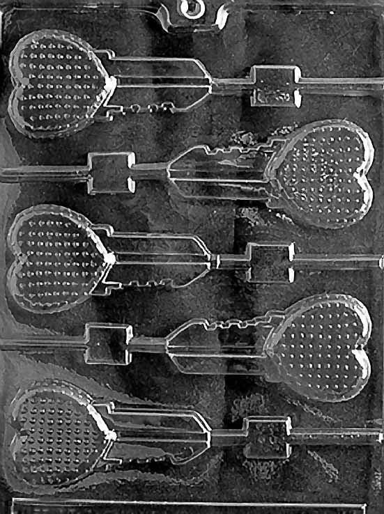 KEY HEART Lollipop chocolate mold with lollipop cavities shaped like hearts accented by keys; clear sheet.