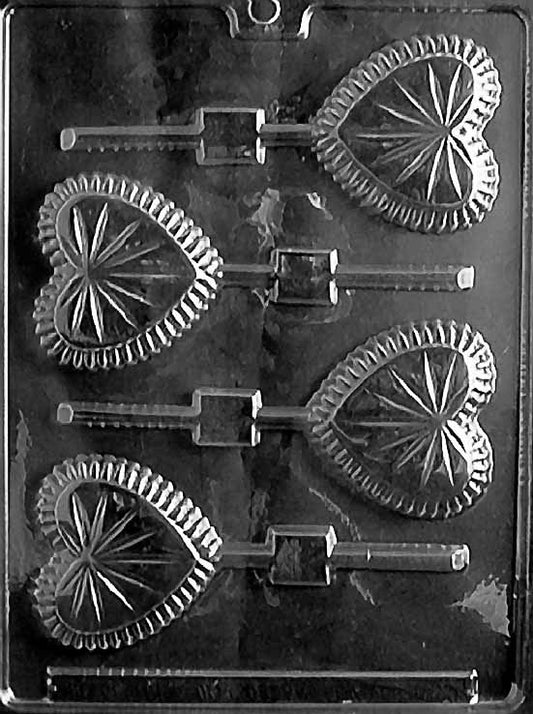 CRYSTAL HEART Lollipop chocolate mold with lollipop cavities styled like crystal hearts; clear mold.