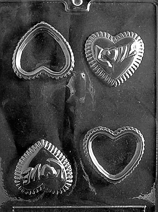 HEART POUR BOX WITH LOVE chocolate mold with heart cavities embossed with “Love”; clear mold.