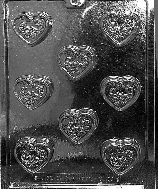 DECORATED HEART MINTS chocolate mold with decorated heart mint cavities; clear mold.