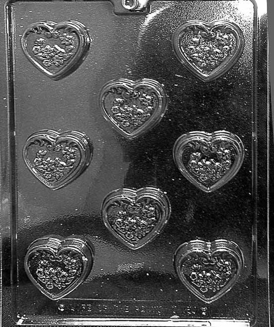 DECORATED HEART MINTS chocolate mold with decorated heart mint cavities; clear mold.