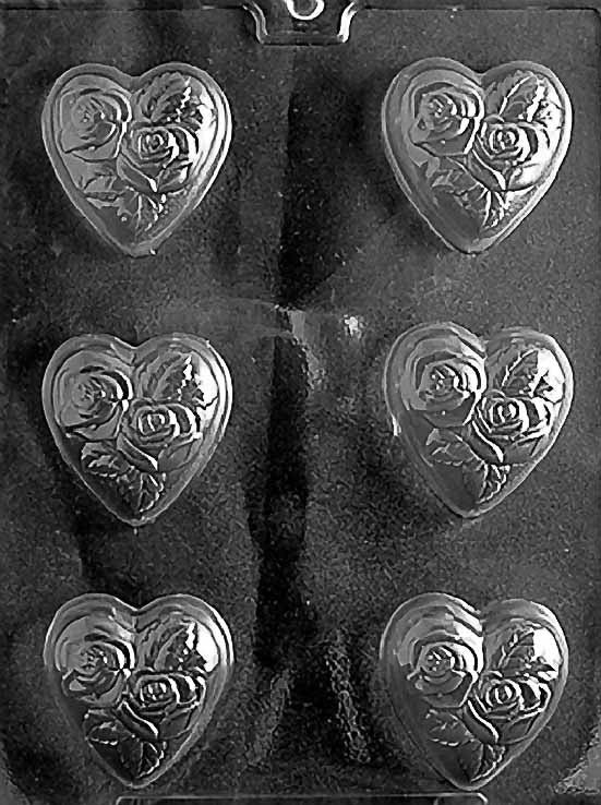 NEW MED HEART WITH FLOWERS chocolate mold with floral heart cavities; clear mold.