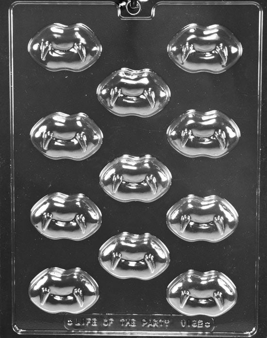 LIPS WITH FANGS chocolate mold showing cavities shaped like lips with fangs; clear sheet.