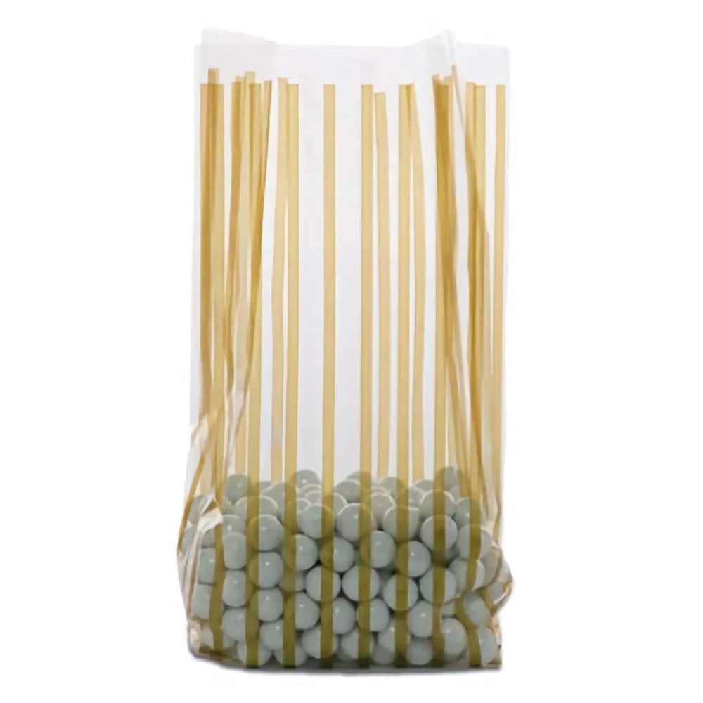 Clear medium cello treat bag with vertical metallic gold stripes, shown standing upright with a gusseted bottom and filled with light gray round candies.