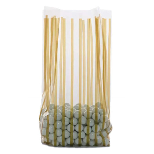 Clear medium cello treat bag with vertical metallic gold stripes, shown standing upright with a gusseted bottom and filled with light gray round candies.