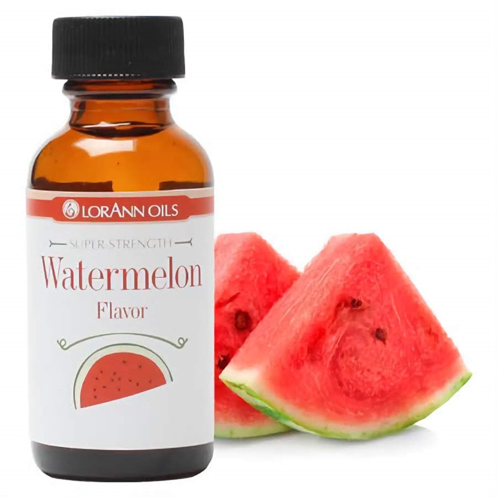 LorAnn's Watermelon Flavor extract in a small bottle with juicy watermelon slices in the background, ideal for summer sweets and beverages.