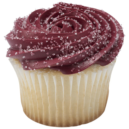 Cupcake with a swirl of deep burgundy buttercream frosting sprinkled with sparkling white sanding sugar crystals in a white paper liner.