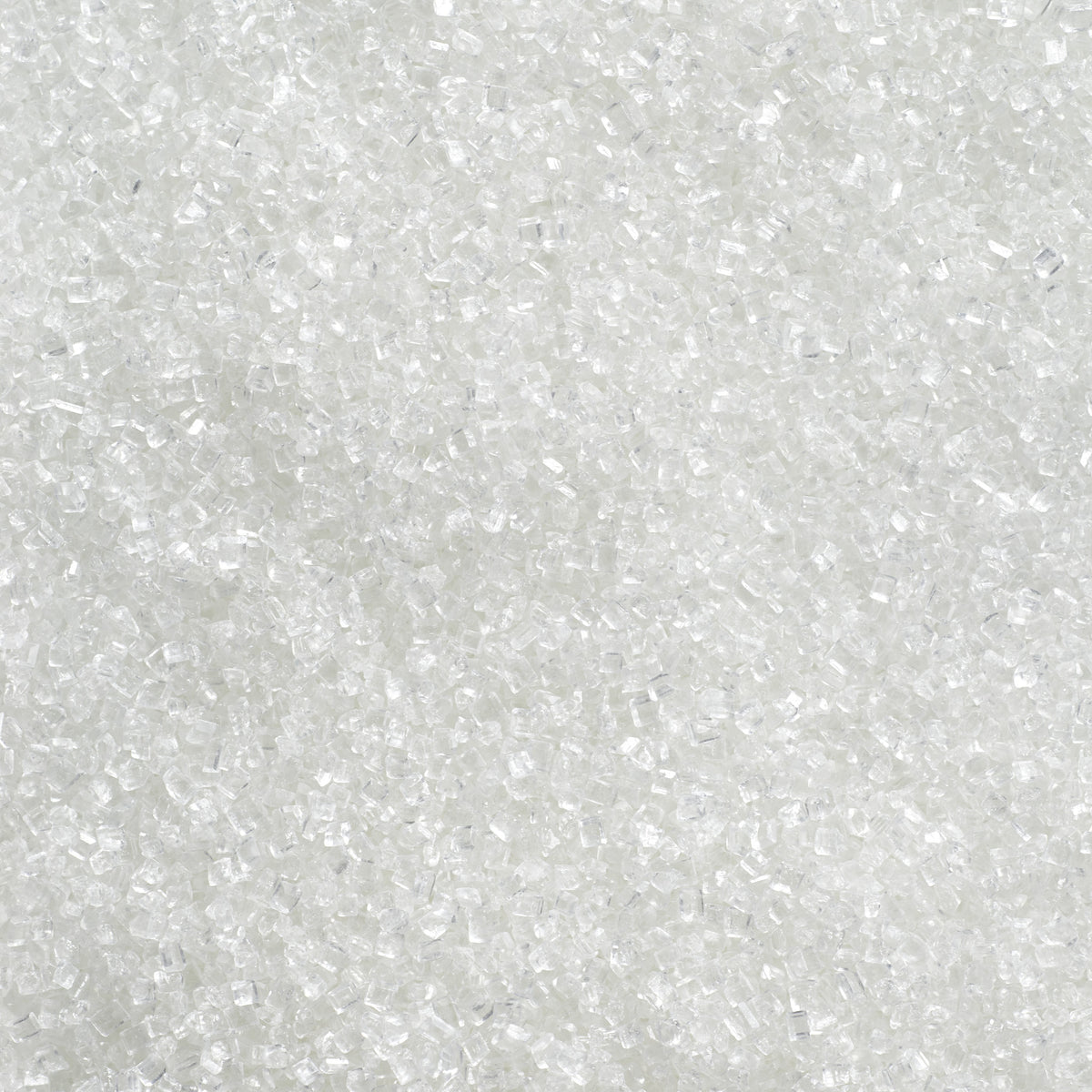 Close-up of white sanding sugar showing coarse, translucent sugar crystals with a clear, sparkling finish.