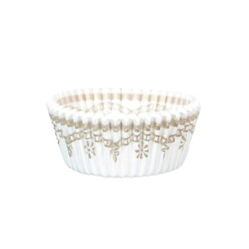 White mini baking cup with a gold Danish-style pattern on the sides, shown on a white background.