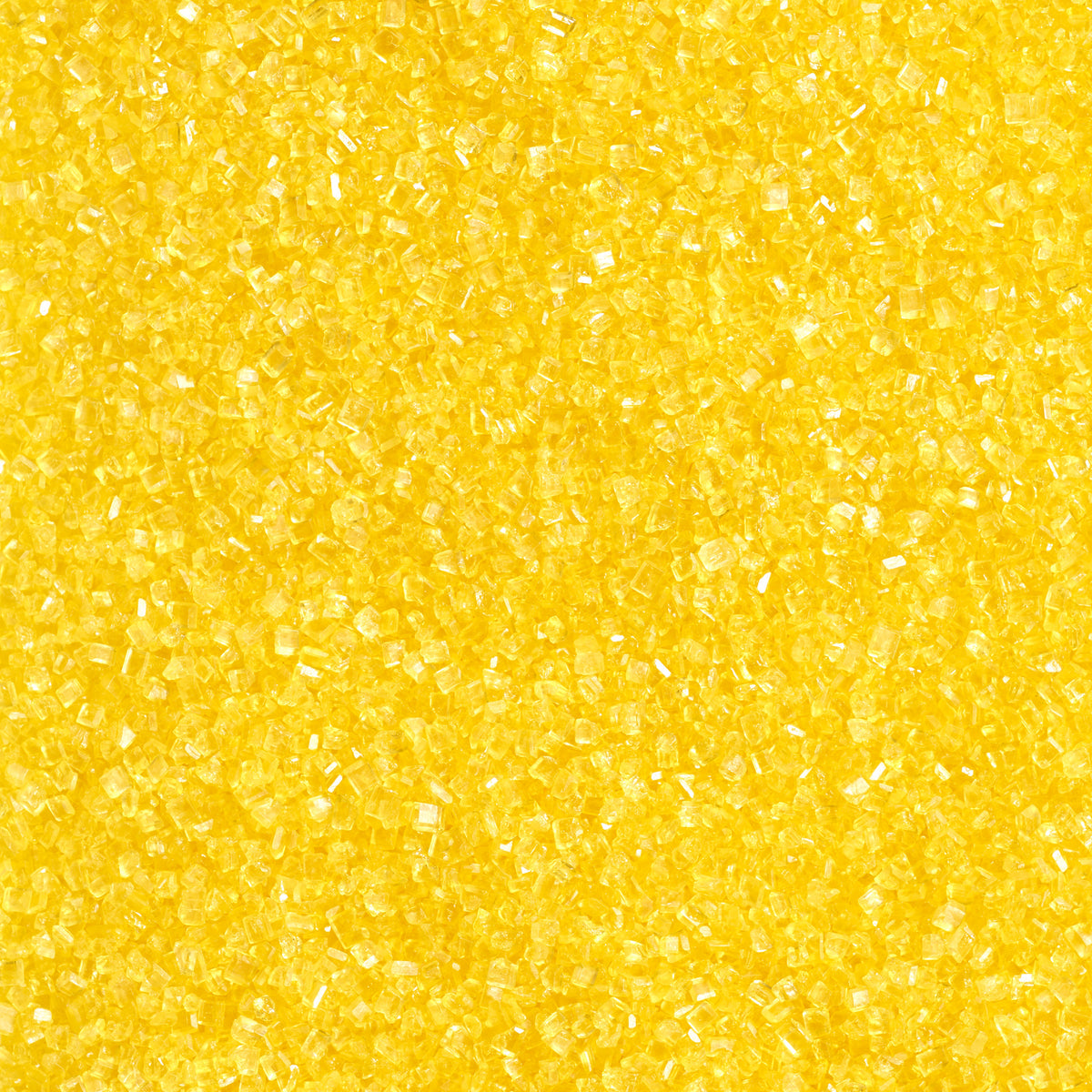 Close-up texture of bright yellow sanding sugar with coarse, translucent sugar crystals that sparkle and reflect light.
