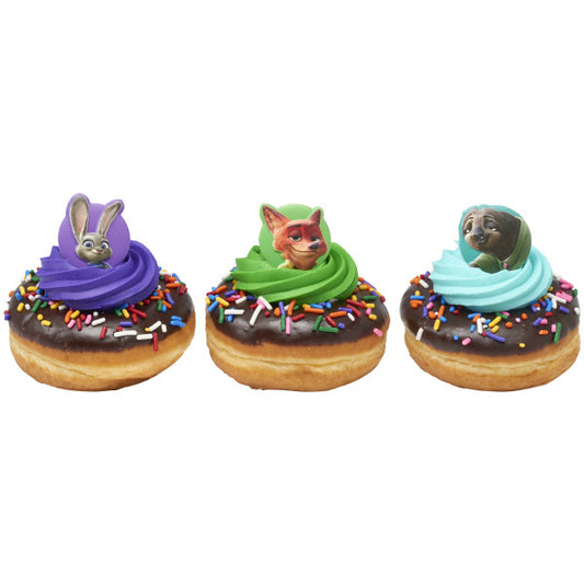 Three chocolate-glazed donuts with rainbow sprinkles and colorful frosting swirls topped with Zootopia character rings featuring Judy Hopps, Nick Wilde, and Flash Slothmore.