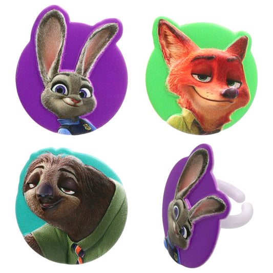 Disney Zootopia cupcake rings with round character toppers showing Judy Hopps on purple, Nick Wilde on green, and Flash Slothmore on teal, plus a side view of the ring band.