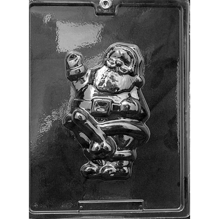 Clear plastic novelty Santa chocolate mold photographed against a black background, featuring one detailed Santa-shaped cavity with an adult anatomical design.