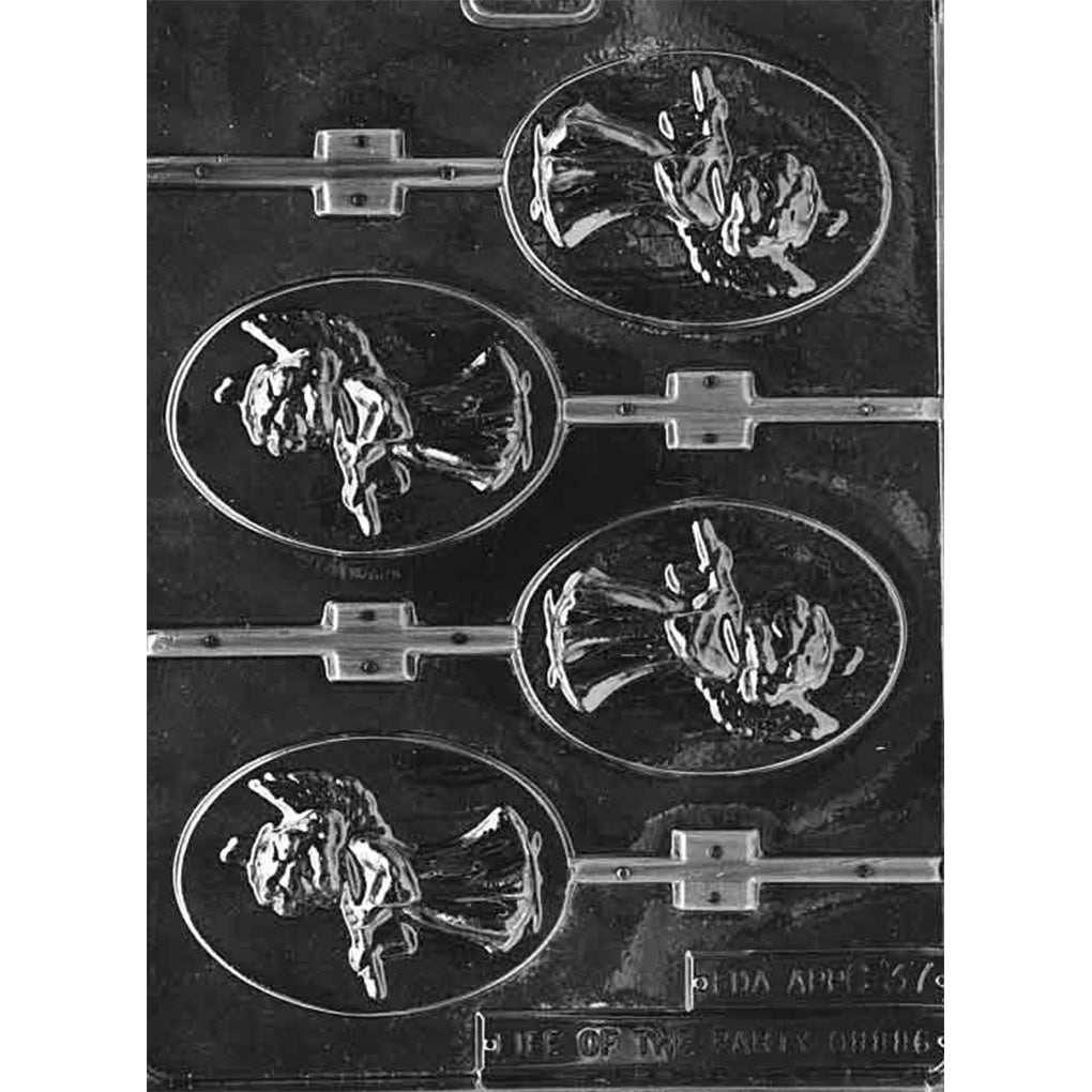 Clear plastic chocolate lollipop mold with five oval cavities, each showing an angel with wings playing a flute, with long stick channels attached; shown on a dark background.