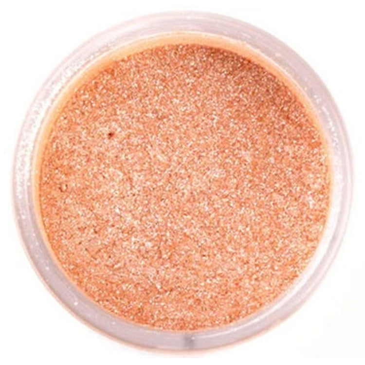 Open round container of Apricot Galaxy Glitter Dust showing its peach color and fine golden sparkle