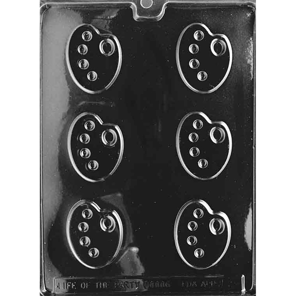 Six-cavity artist palette chocolate mold with compact oval palette shapes, thumb-hole details, and four raised paint wells in each cavity