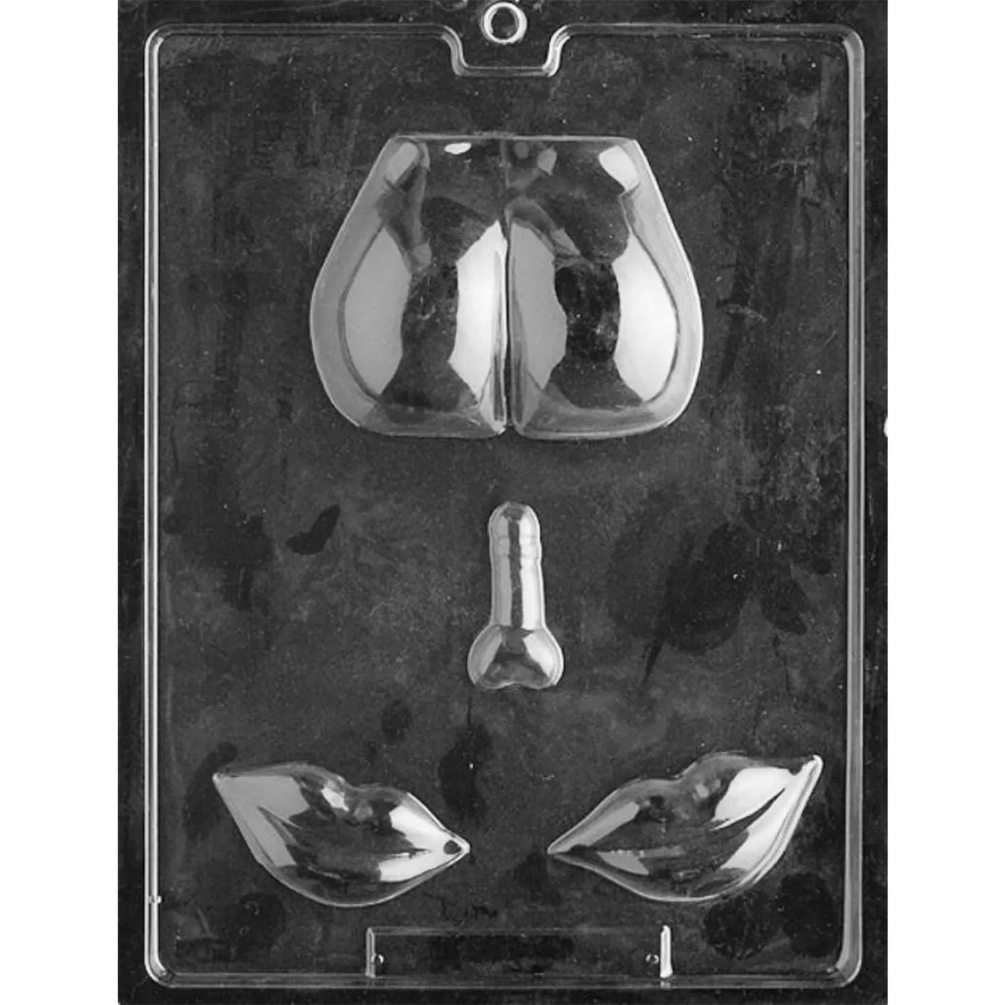 Clear plastic adult chocolate mold photographed against a black background with four cavities featuring a rounded rear end, small penis, and two sculpted pairs of lips.