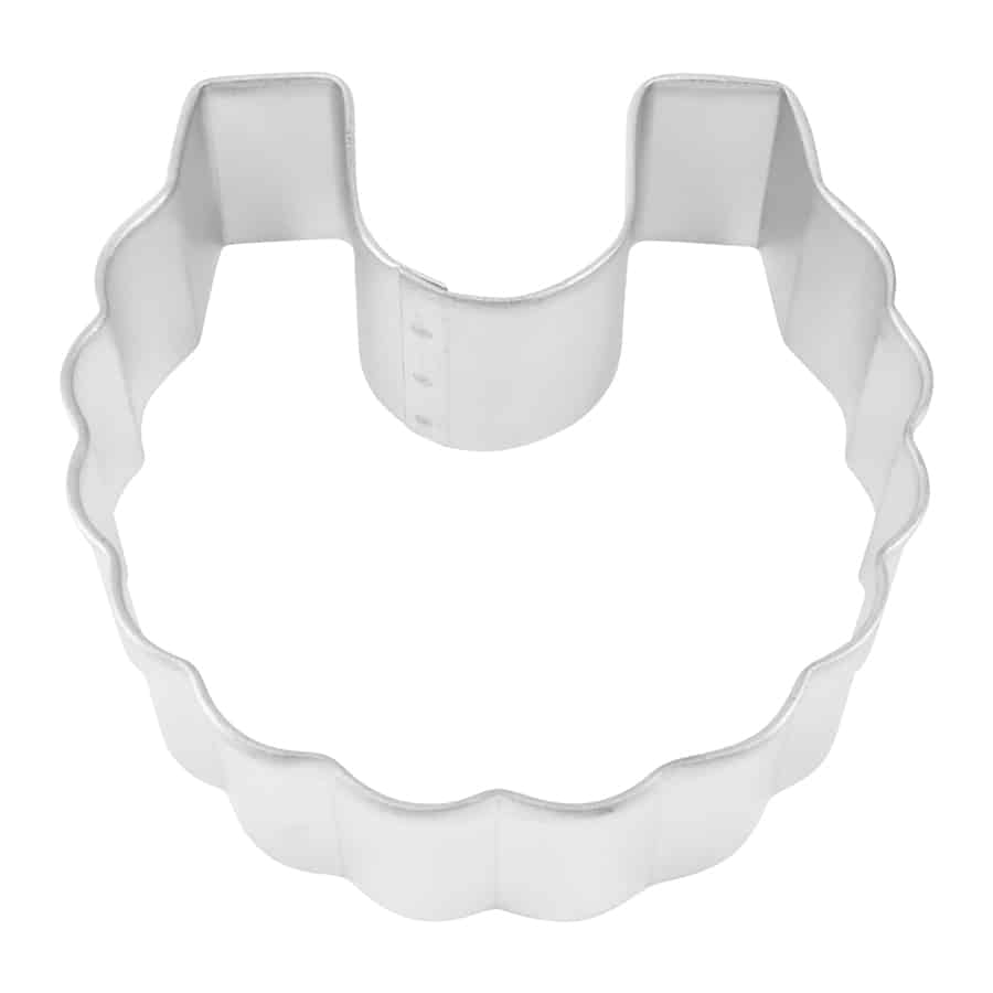 Silver baby bib-shaped cookie cutter with scalloped edges.