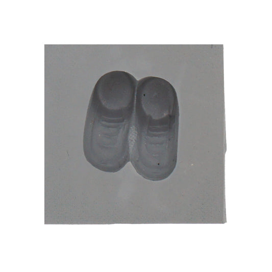 Close-up of a single cavity Baby Booties Rubber Mint Mold made from gray 100% natural rubber, showing defined baby shoe details like soles and laces.