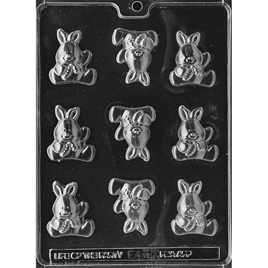 Clear Baby Bunny with Carrot Chocolate Mold photographed against a black background with 9 seated bunny cavities featuring long ears and carrots held in their paws.