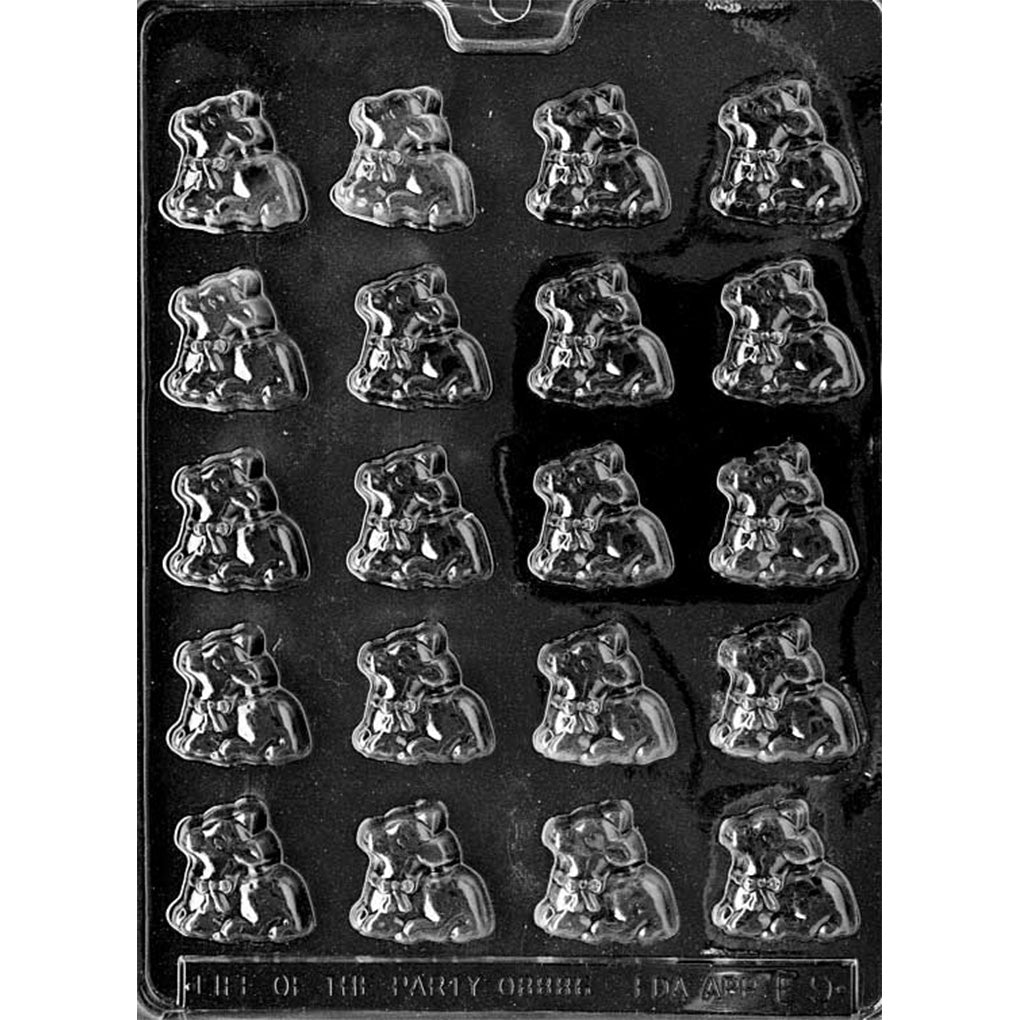 Chocolate mold with 20 bite-sized lamb cavities, each featuring a resting lamb with a ribbon and bow around its neck. Ideal for making spring or Easter-themed chocolates.