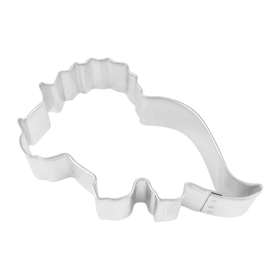 Metal cookie cutter shaped like a baby triceratops with a frilled head and curved tail, ideal for dinosaur-themed baking.