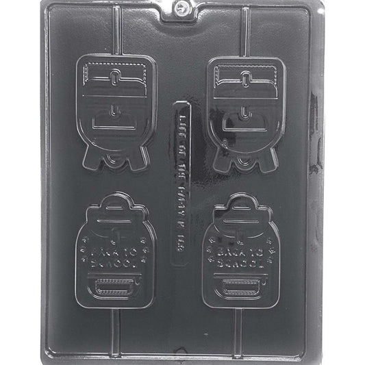 Clear Backpack Chocolate Lollipop Mold photographed against a black background with four detailed backpack cavities in two designs and built-in stick channels.