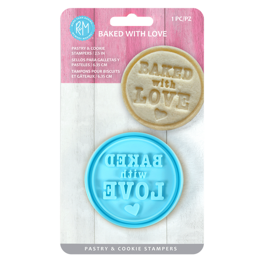 "Baked with Love" pastry and cookie stamper in retail packaging, featuring a blue plastic stamp and an embossed cookie.