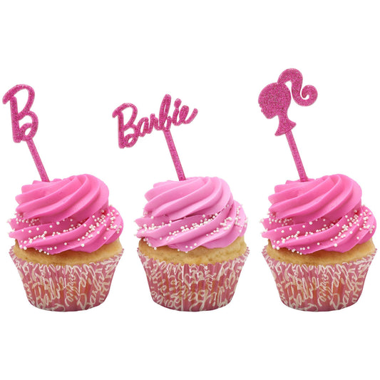 Pink glitter Barbie “B,” Barbie script, and ponytail silhouette DecoPics® displayed on three pink-frosted cupcakes
