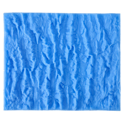 Blue silicone impression mat with bark texture pattern