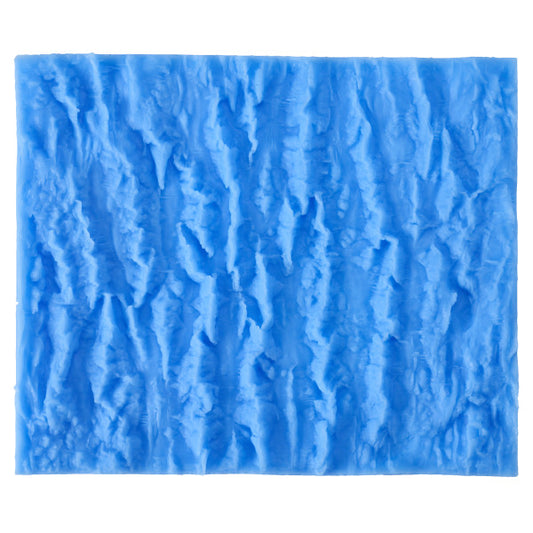 Blue silicone impression mat with bark texture pattern