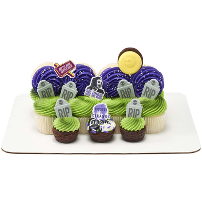 BEETLEJUICE cupcake rings arranged on a Halloween cupcake display with purple and green frosting and tombstone decorations