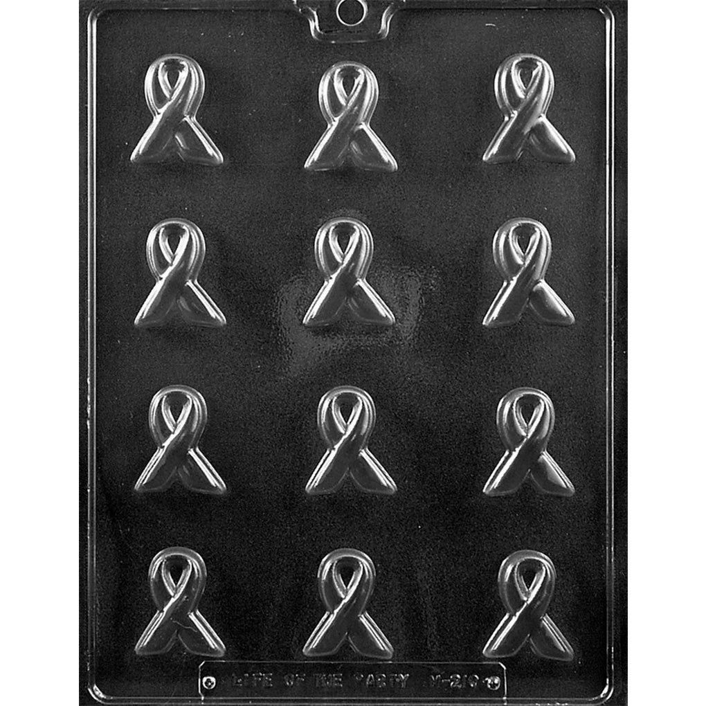 Clear plastic chocolate mold with 12 bite-sized awareness ribbon cavities arranged in a grid for making ribbon-shaped chocolates.