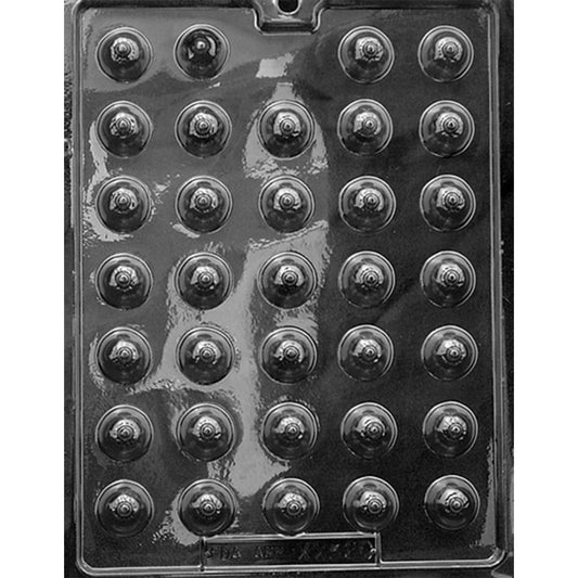 Clear plastic chocolate mold photographed against a dark background, featuring 34 small round breast-shaped cavities with raised nipple details arranged in rows.