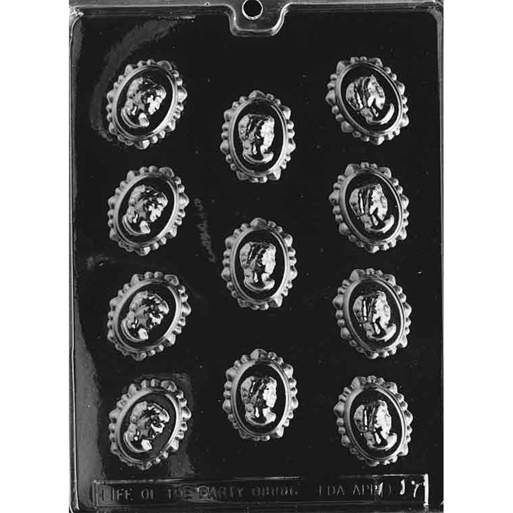 Clear plastic chocolate mold with ten oval cameo cavities, each featuring a raised portrait center and scalloped lace-like border, shown on a dark background.