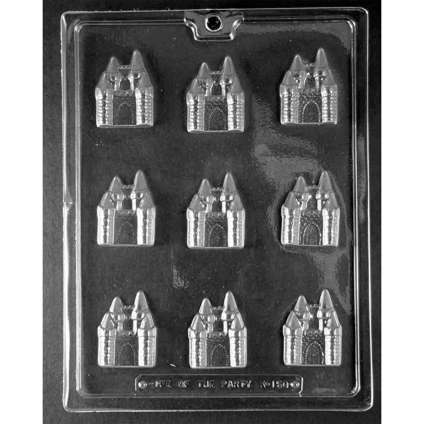 Clear Bite-Sized Castle Chocolate Mold photographed against a black background with 9 castle-shaped cavities featuring towers, pointed turrets, and arched doorways.