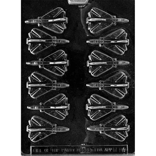 Clear chocolate mold with 12 small fighter jet-shaped cavities arranged in two columns, each with a pointed nose, swept wings, and tail fins.