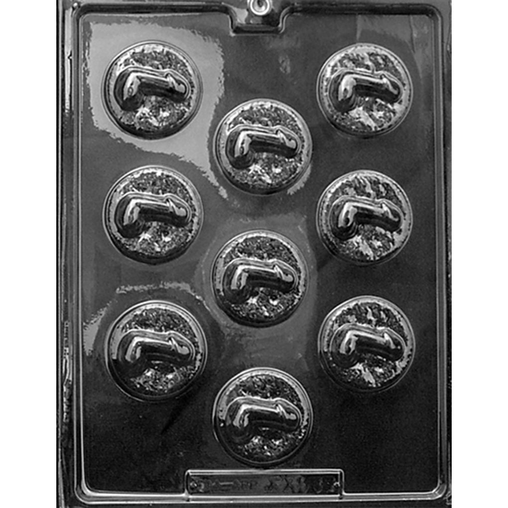 Clear plastic Bite Size Penis Mints Chocolate Mold photographed against a dark background, showing nine round candy cavities with raised penis designs in the center.