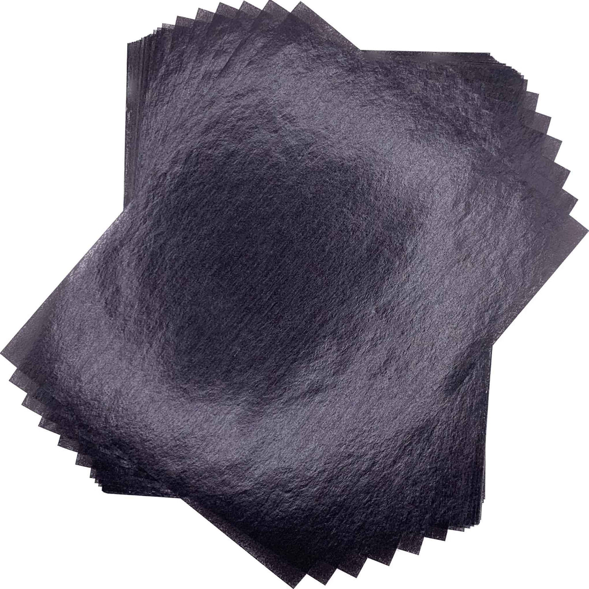 Overlapping stack of black 4" x 5" wax caramel and taffy wrapper sheets displayed against a white background.
