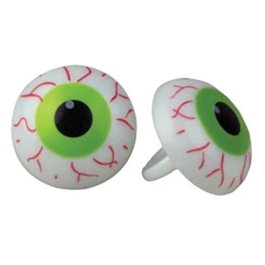 Two green eyeball cupcake toppers with black pupils and red veins on a white background.