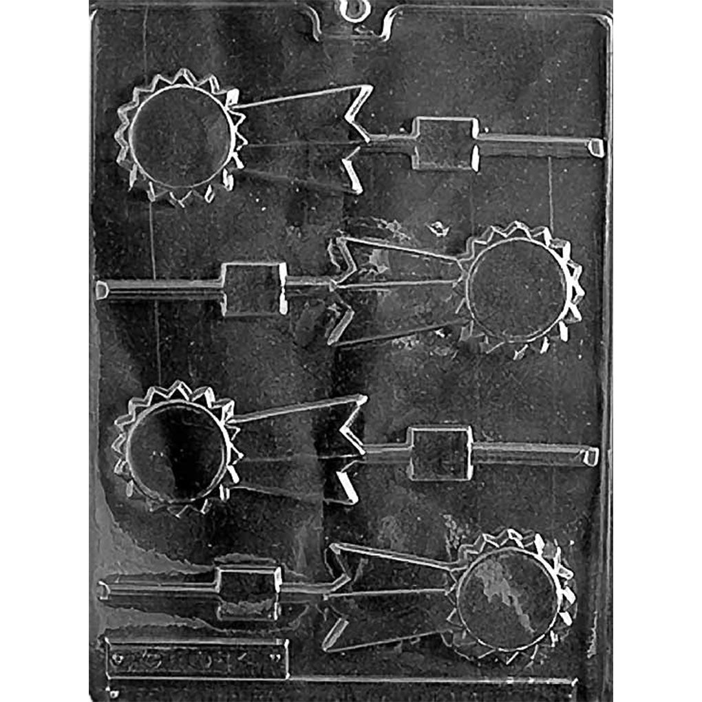 Clear plastic chocolate lollipop mold with four award-ribbon cavities featuring smooth center plaques, pointed rosettes, V-cut tails, and stick channels