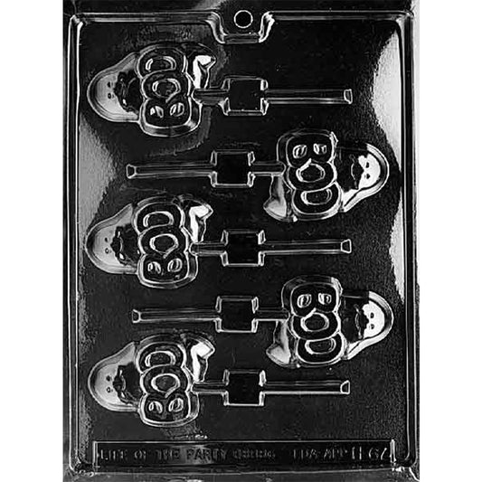 Clear plastic chocolate lollipop mold with six ghost-shaped cavities, each ghost holding raised “BOO” lettering.