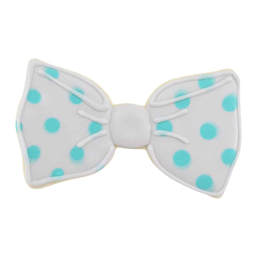 Another bow tie cookie with a similar design but a slightly different shade of white