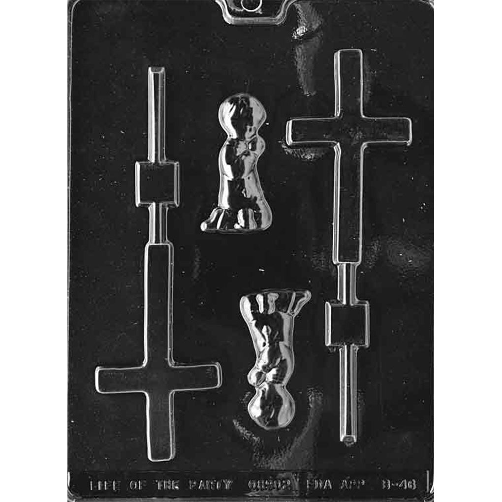 Clear plastic boy christening chocolate mold photographed on a black background, featuring two cross-shaped lollipop cavities with stick grooves and two kneeling praying boy figure cavities with raised details.