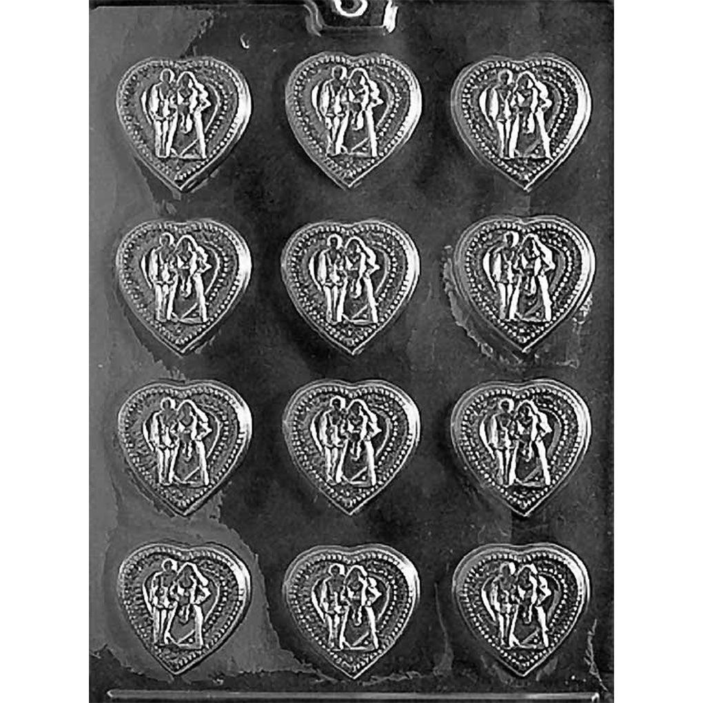 Clear plastic chocolate mold tray showing multiple small heart-shaped cavities, each embossed with a bride and groom couple inside a dotted heart border.