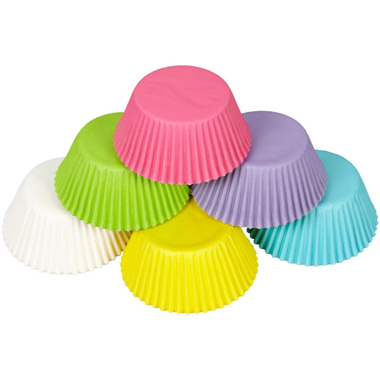 Stack of pastel-colored cupcake liners in pink, purple, yellow, green, white, and blue.