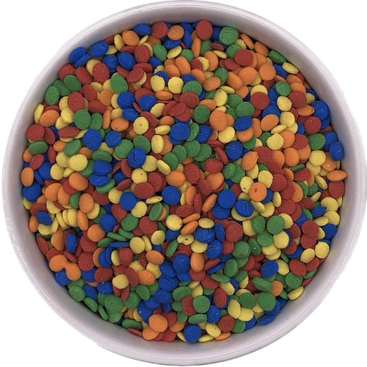 Bowl filled with colorful sequin sprinkles in red, orange, yellow, green, and blue, ideal for decorating cakes, cupcakes, and cookies.