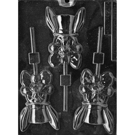 Clear plastic chocolate lollipop mold showing a bunny with a tall top hat and bowtie, with three bunny cavities and built-in stick slots on a dark background.